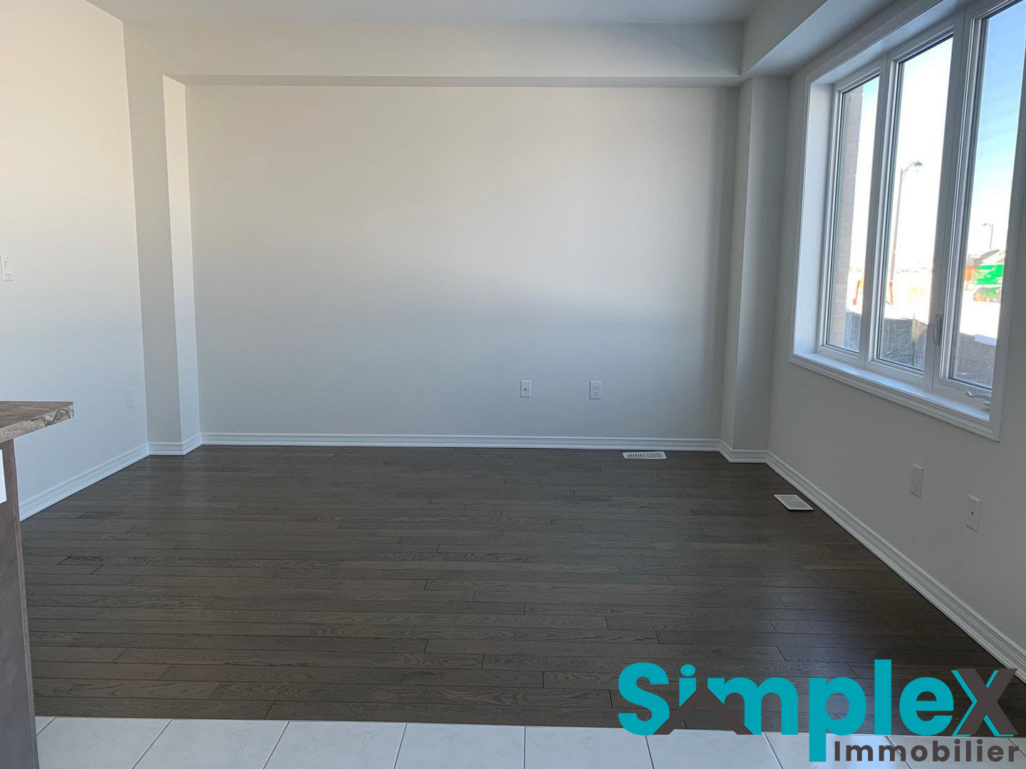 Appartement vacant et lumineux avec grande fenestration